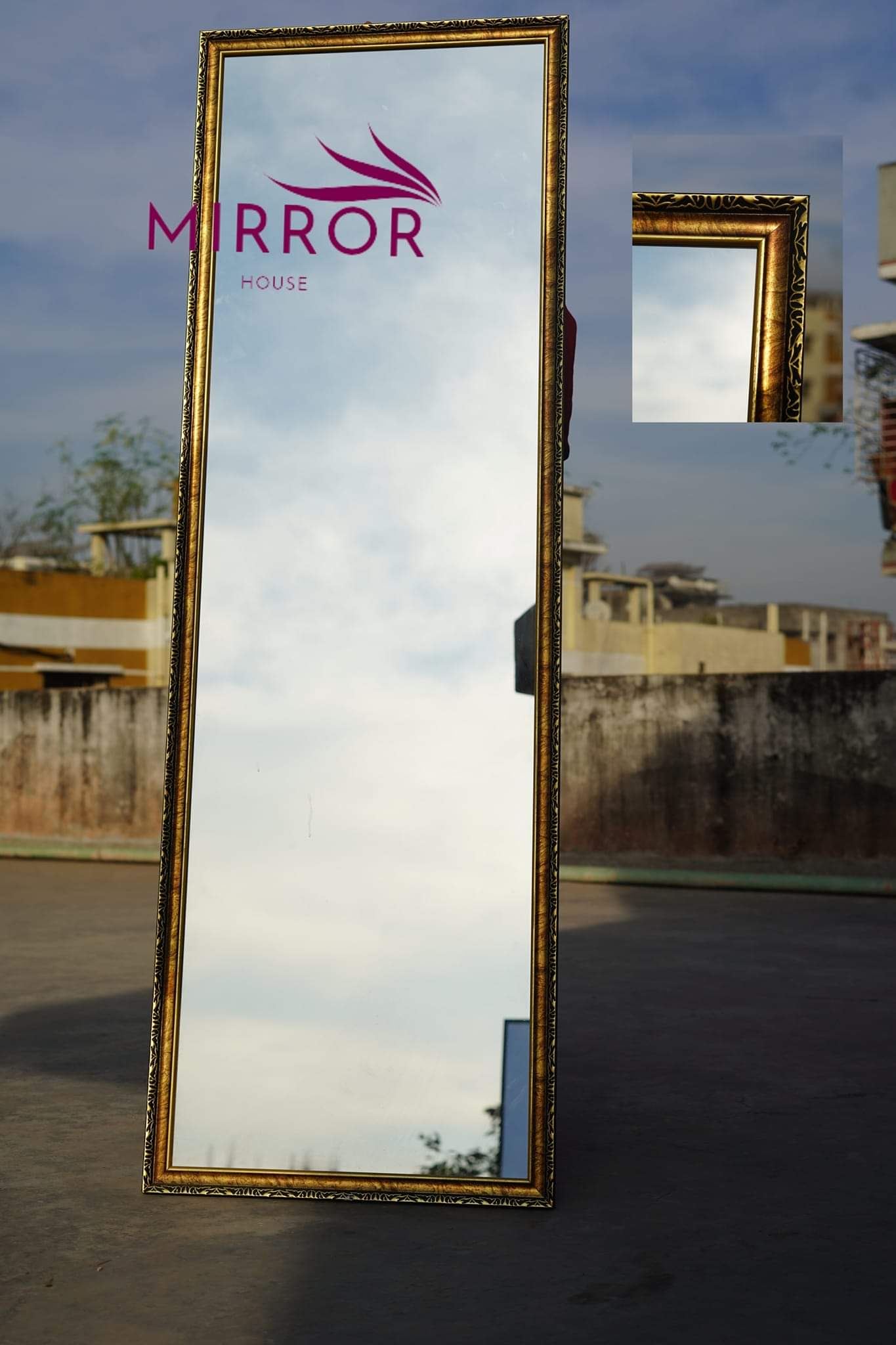 golden frame stand mirror